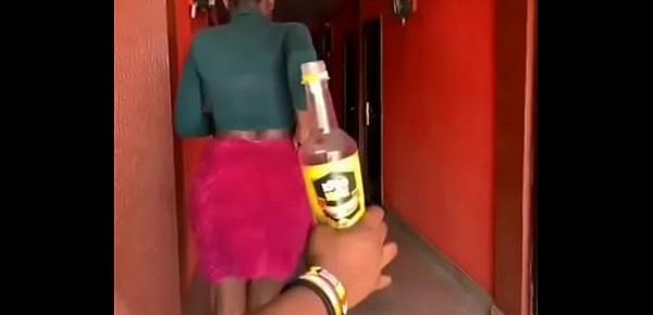 GHANA GIRL OPENS A BOTTLED DRINK WITH HER BREASTS